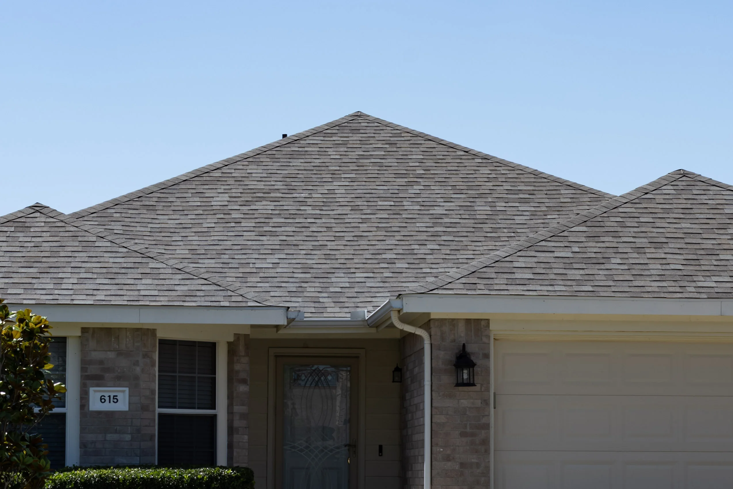 Completed asphalt-shingle roof after Firehouse Roofing work