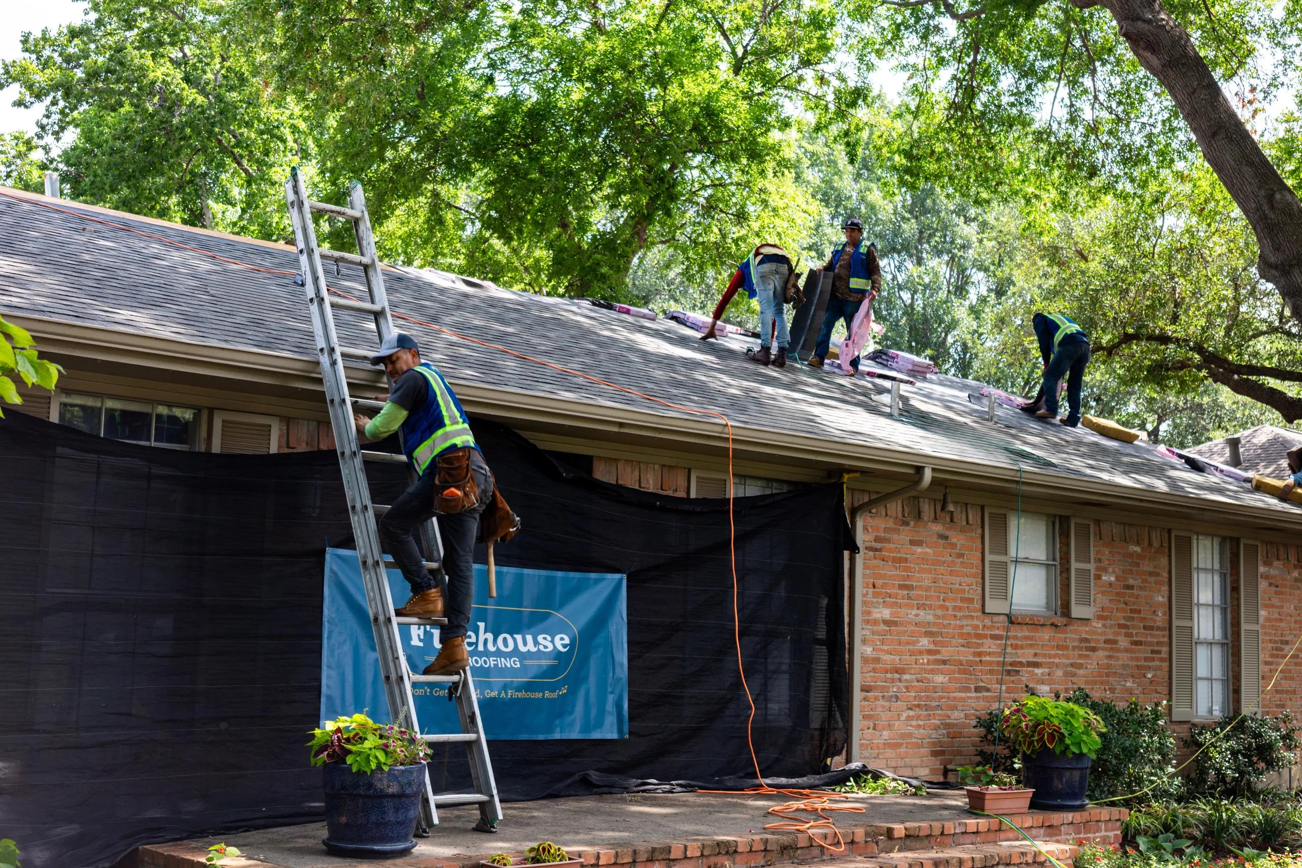 Roof replacement in progress on a protected North Texas home