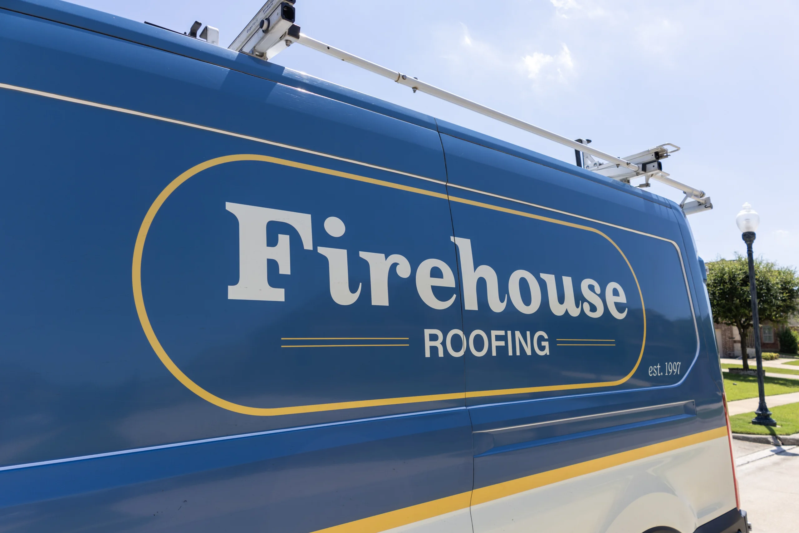 Firehouse Roofing branded service van