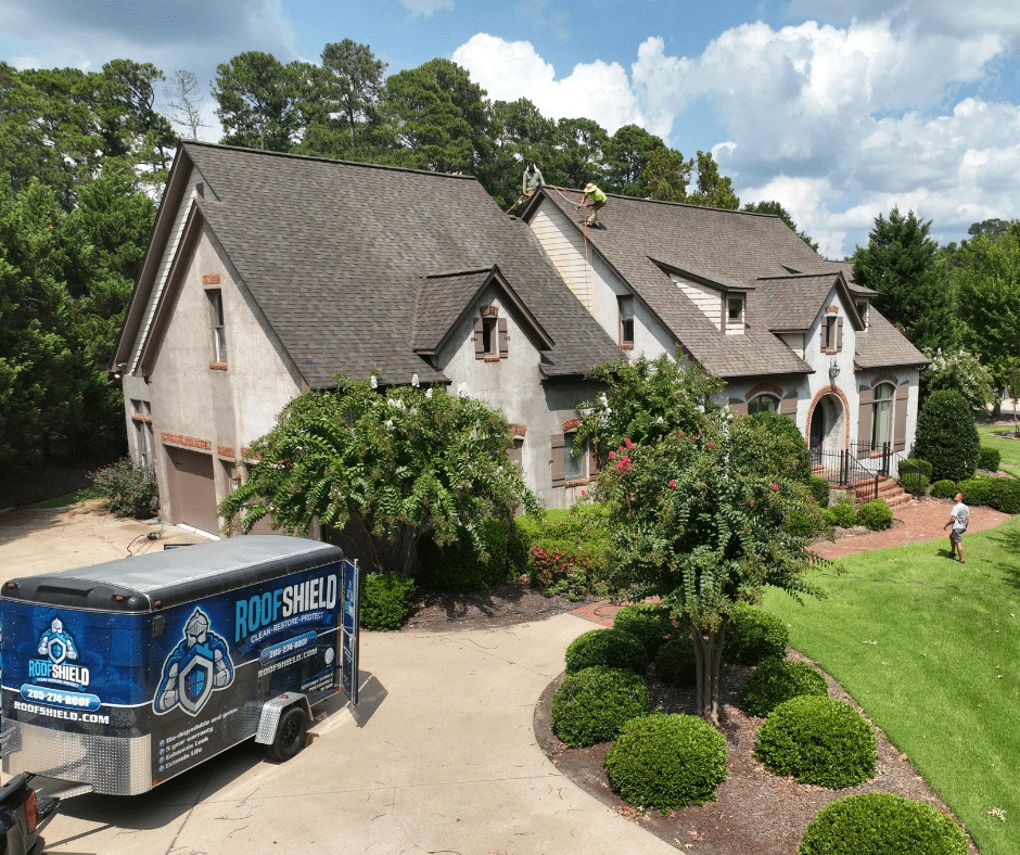 Home served by a Roof Shield treatment truck